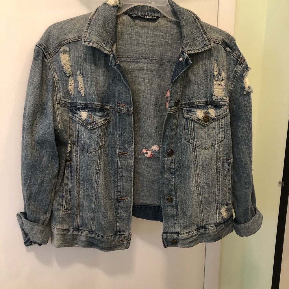 Ripped jean jacket with tiger